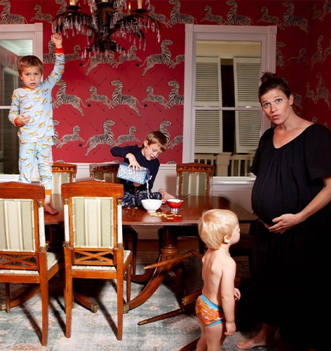 a group of people standing in a room