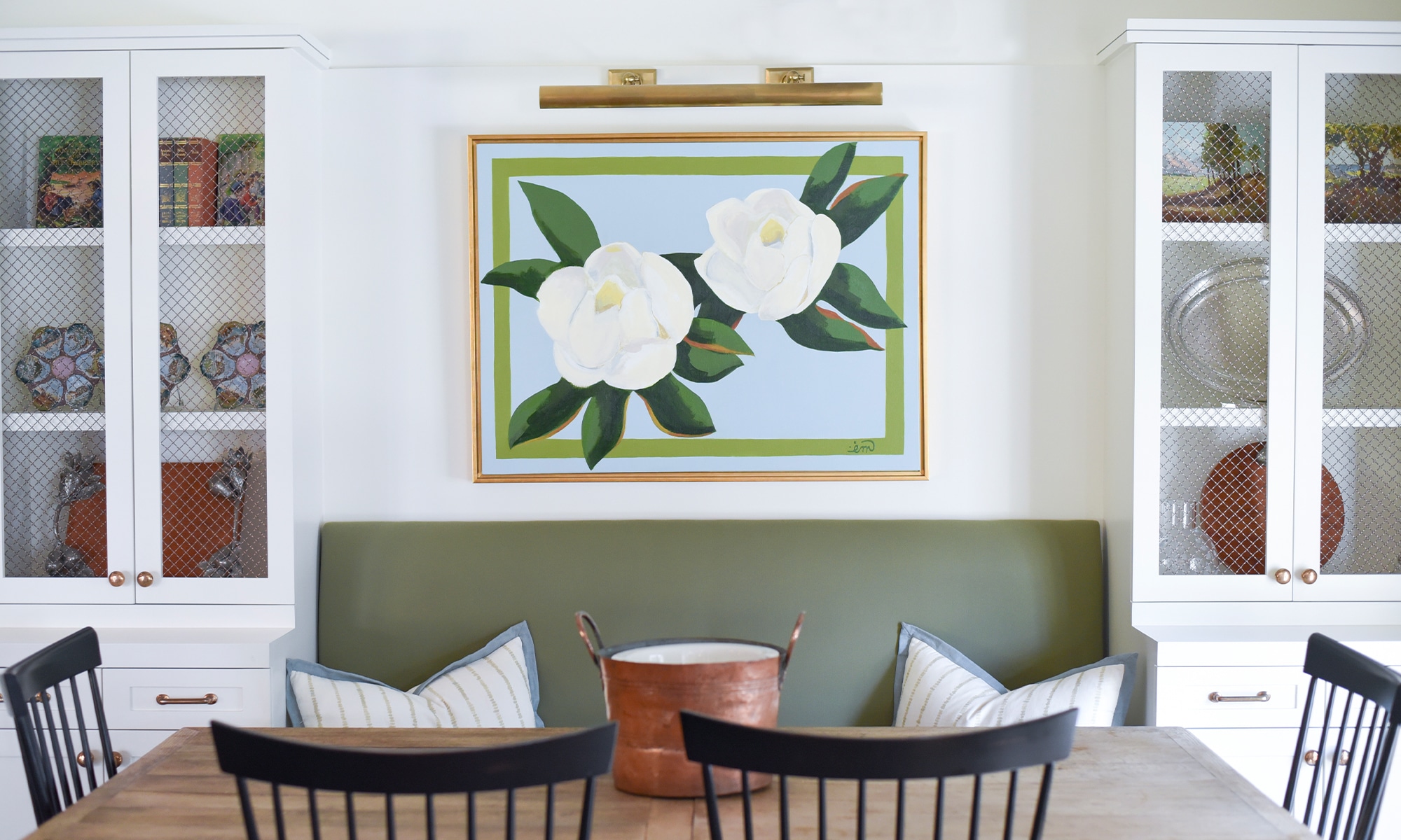 a dining room table in front of a window