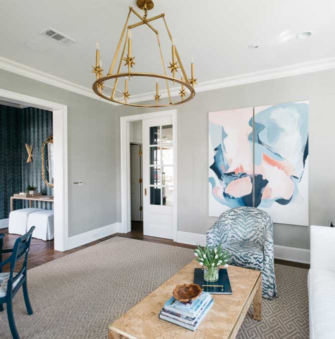 a living room filled with furniture and a fireplace