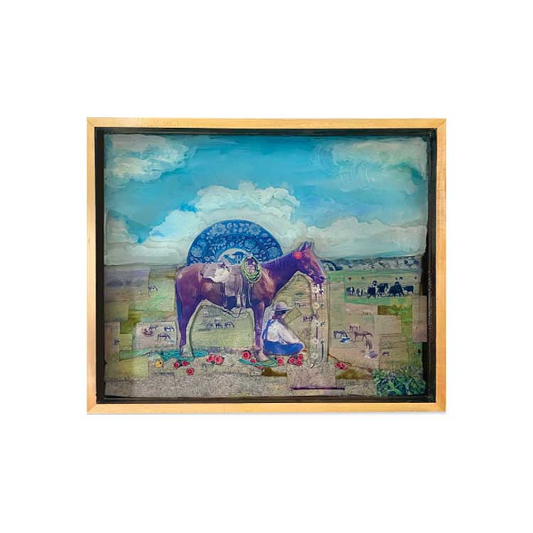 a painting in a frame hanging on a wall