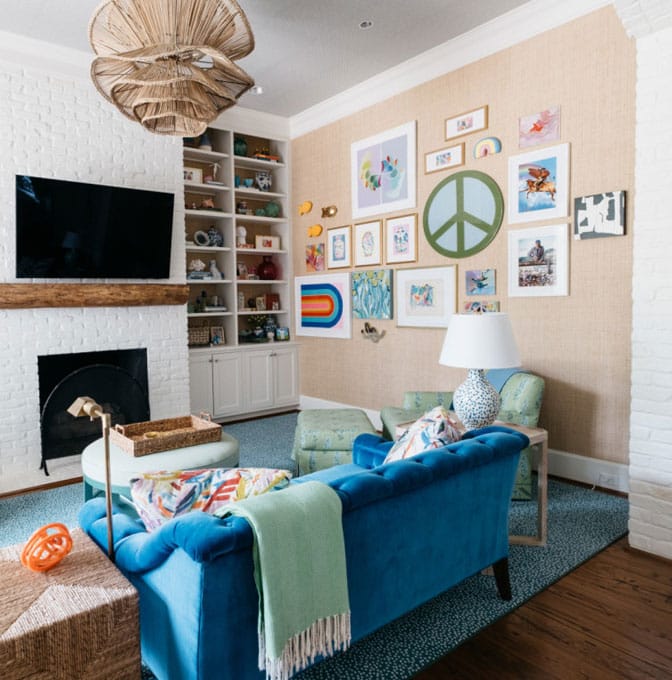 a living room filled with furniture and a blue sky